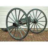 A FIELD GUN CARRIAGE IN THE 19TH CENTURY STYLE, of characteristic construction, the grey painted