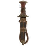 A 19TH CENTURY NORTH AFRICAN ARM DAGGER, 15cm flattened diamond section blade, rusted,