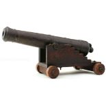 A 19TH CENTURY CAST IRON MODEL NAVAL CANNON, 15.75inch five-stage barrel with flared ring turned