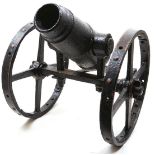 A 19TH CENTURY IRON CARRONADE AND CARRIAGE, 24inch multi-stage tapering heavy barrel, mounted on its