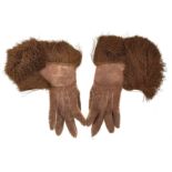 A PAIR OF CROMWELLIAN STYLE GAUNTLETS, of soft leather with tassled fringes, contained in a glazed