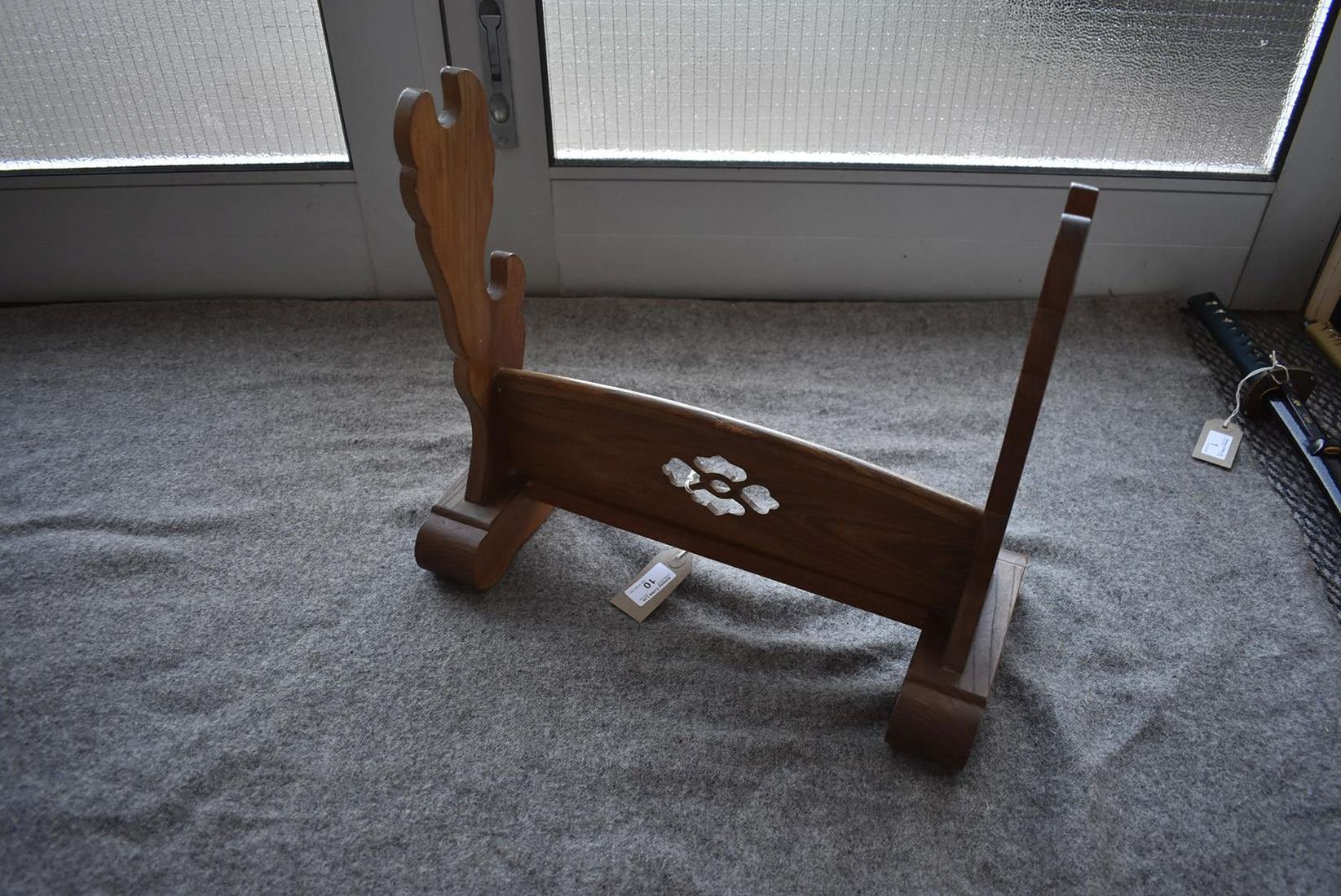 A JAPANESE OAK SWORD STAND, the central panel pierced with a stylized flowerhead. - Image 4 of 4