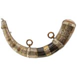 A NORTH AFRICAN POWDER HORN, the natural form polished horn body applied with ornate foliate