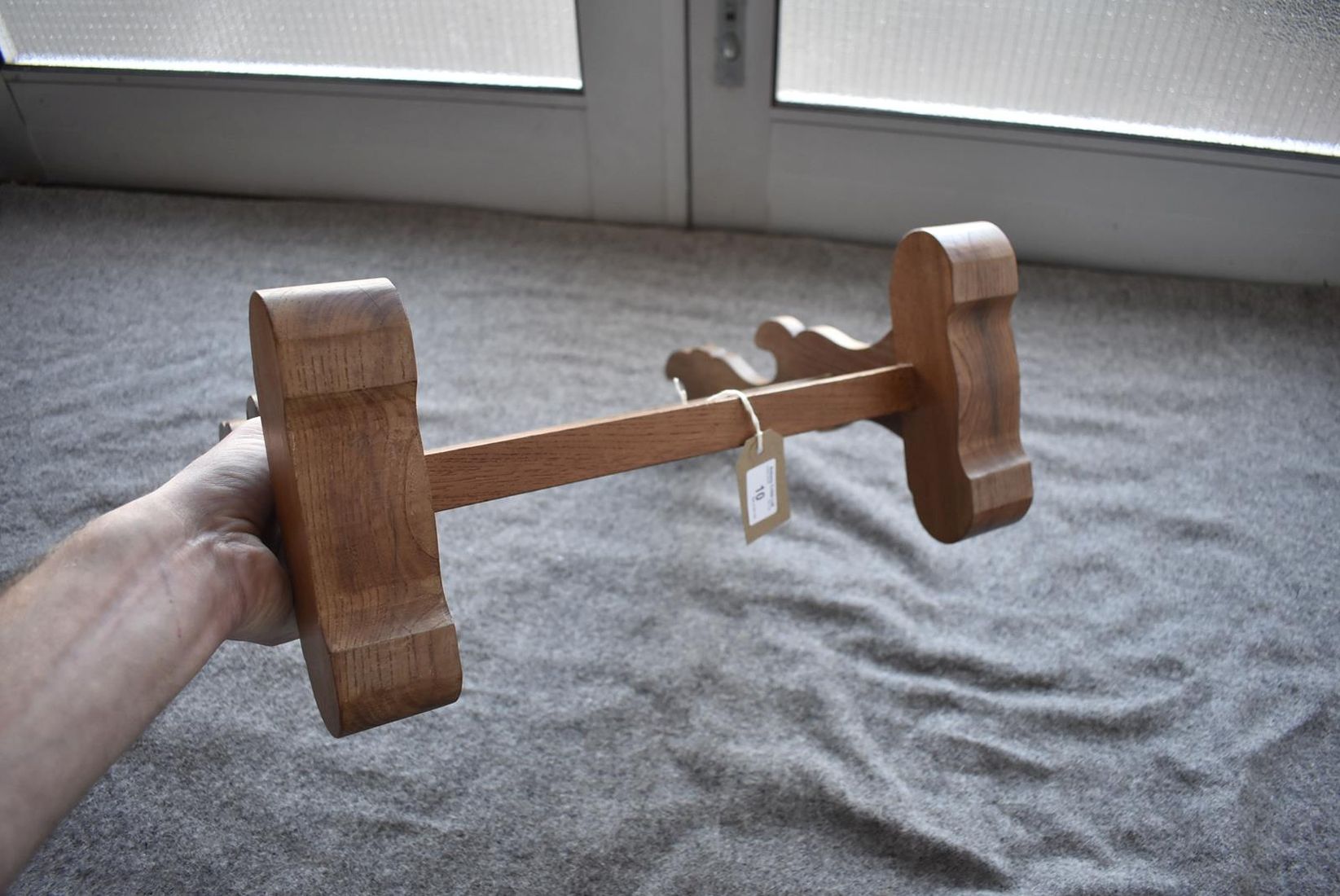 A JAPANESE OAK SWORD STAND, the central panel pierced with a stylized flowerhead. - Image 3 of 4