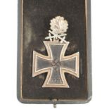 KNIGHT'S CROSS WITH OAK LEAVES AND SWORDS, a Juncker jeweller's copy, the cross stamped 800 L12, and