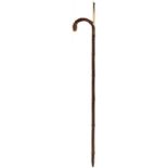 AN EARLY 20TH CENTURY HORSE MEASURING GADGET WALKING STICK BY HOWELL & CO., of bent bamboo with