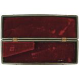 A 19TH CENTURY CONTINENTAL AIR PISTOL CASE, the plush red velvet lined interior 35cm x 9.75cm, the