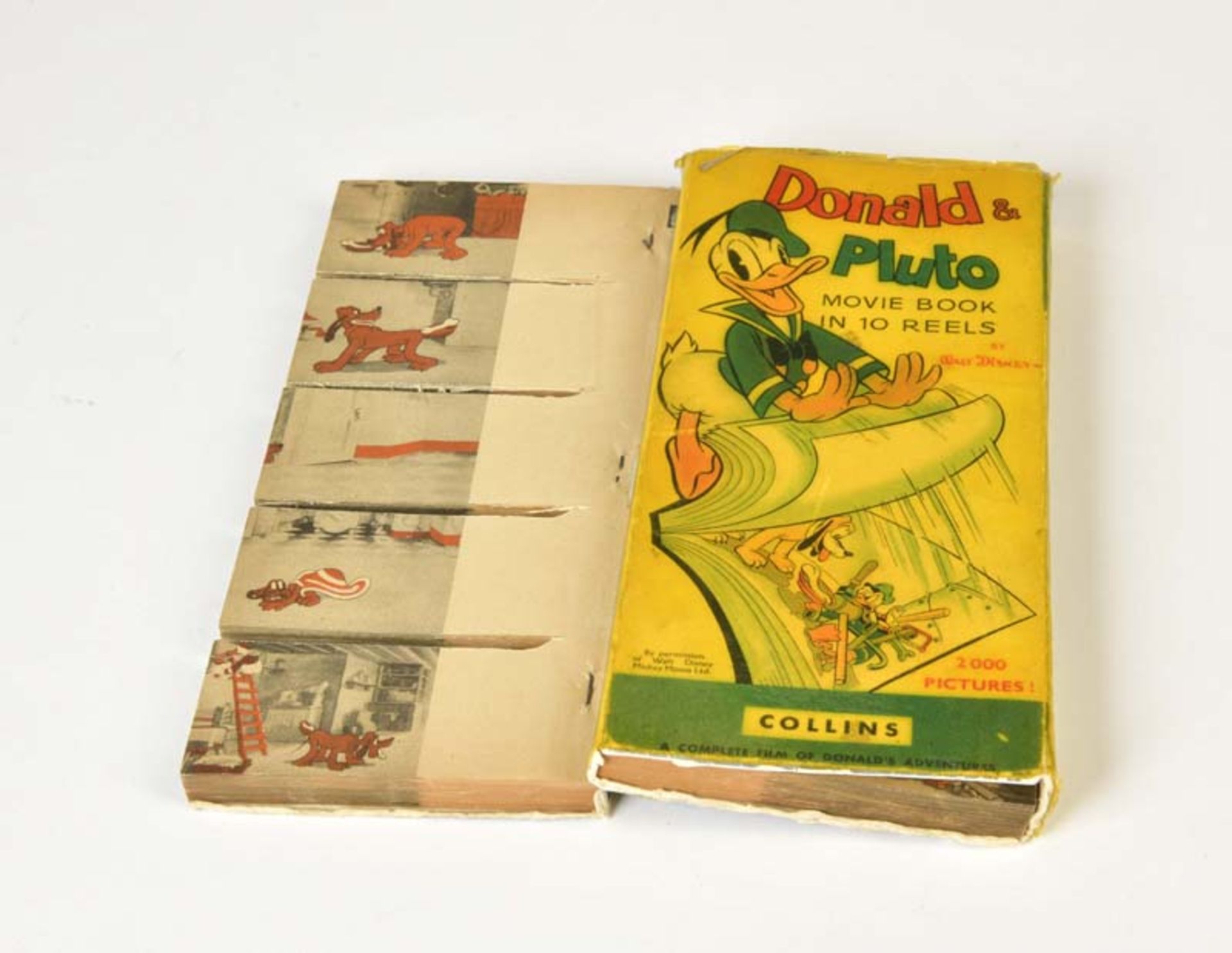 Collins, Donald + Pluto Movie Book with 10 Flip Books, Copyright 1939, rebound, otherwise good