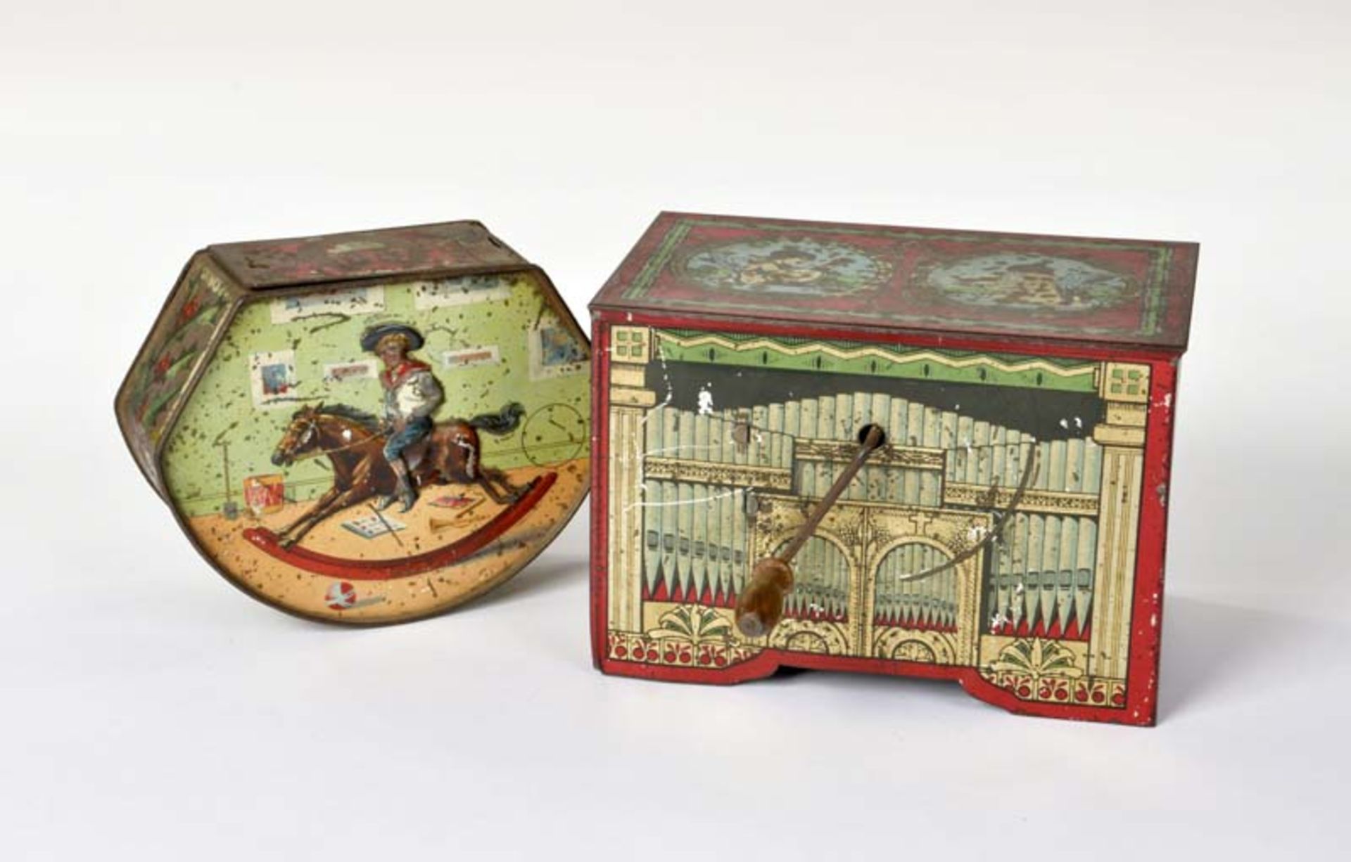 Gray Dunn & Co., Biscuit Can with Rswing Rider + Can with Music Box, tin, paint d. due to age, C 2-