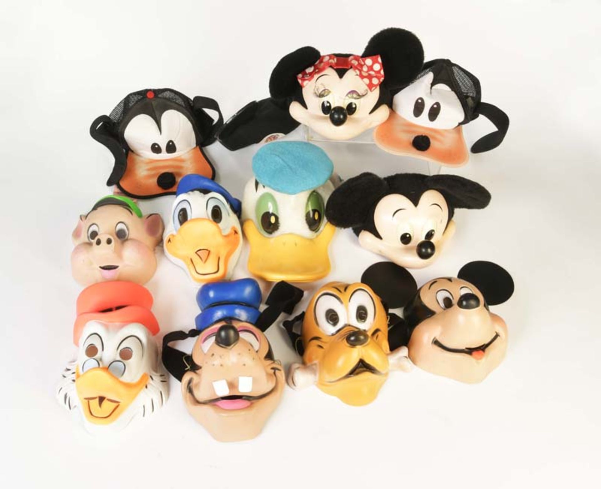 12 Caps, Masks + Hats with Disney Motives, W.-Germany a.o., plastic + fabric, C 2