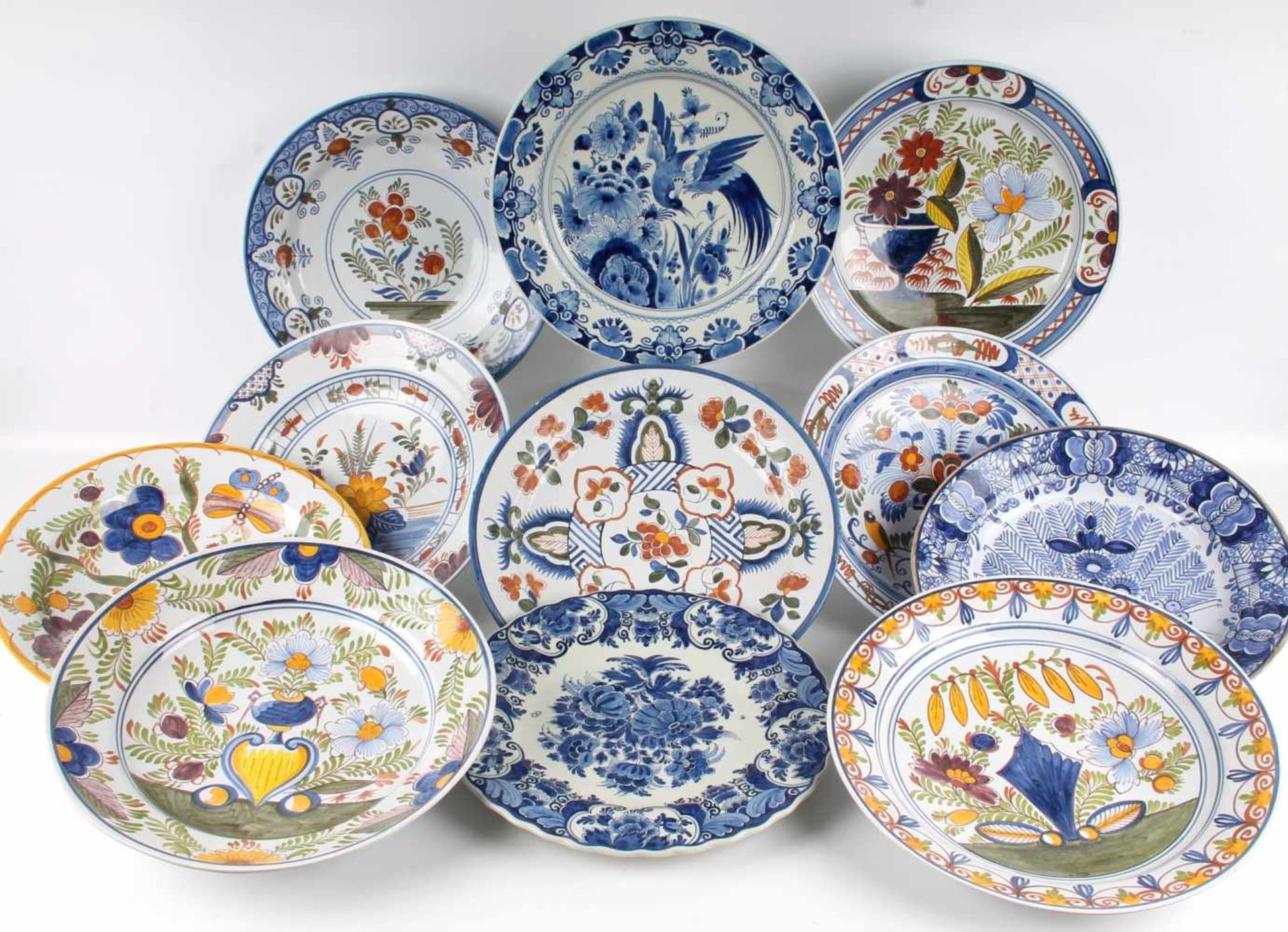 Konvolut niederländische Fayence, lot of dutch ceramic, 11 Fayence Teller/Schalen, u.a. Porcelaine