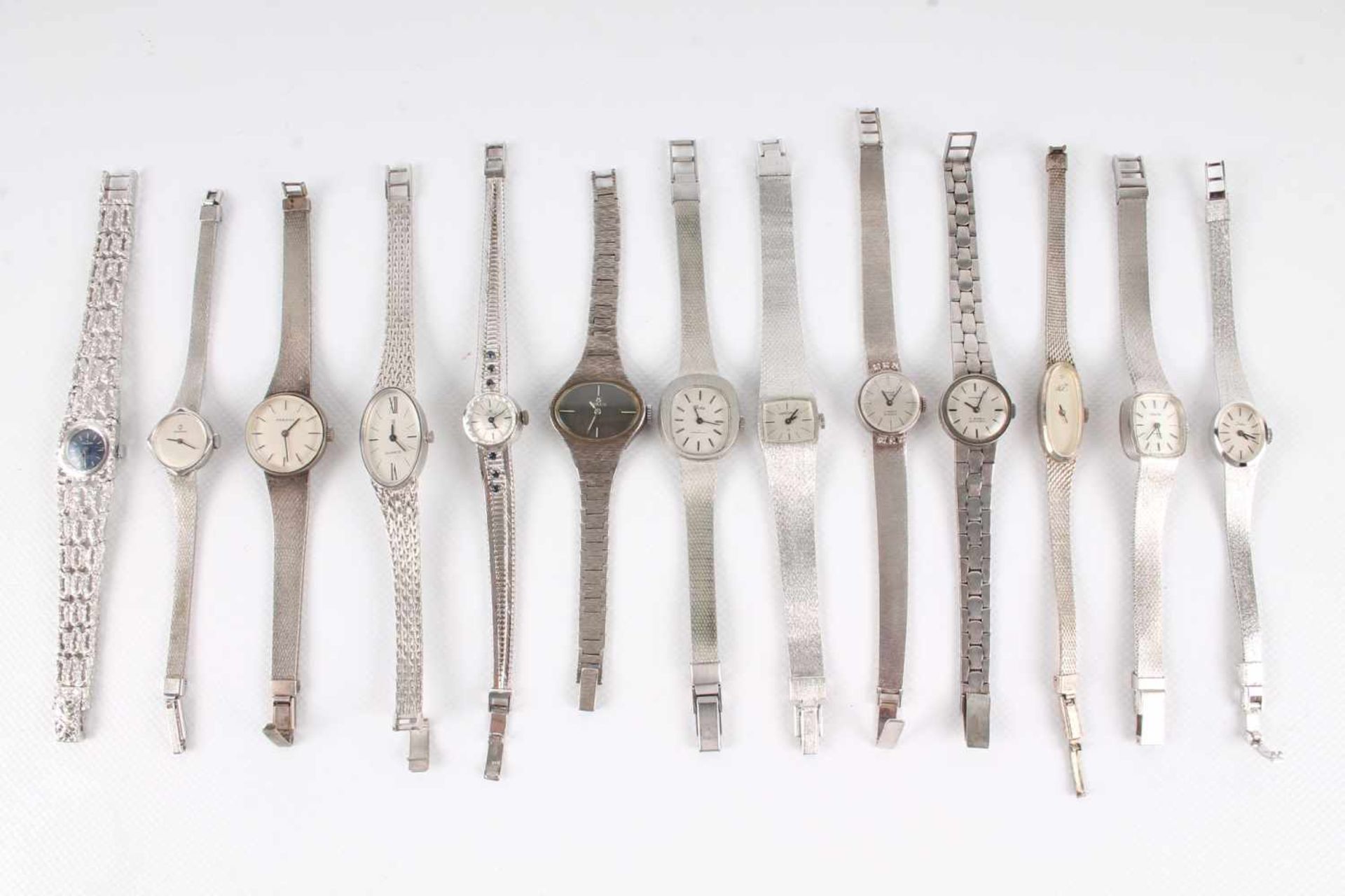 13 Silber Armbanduhren, 13 silver wristwatches,