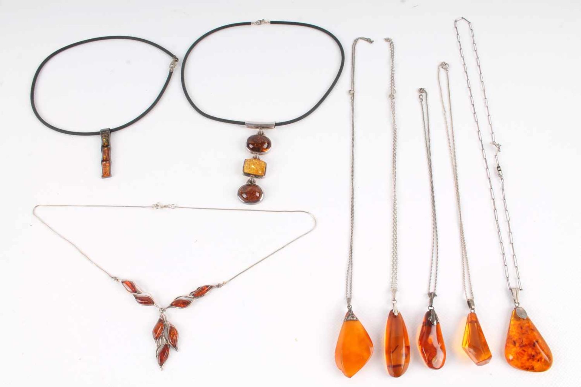 8 Bernsteinketten, amber necklaces,