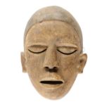 Lega MaskeLega Maske D.R.Kongo Ovale Maske mit dunklem Haarteil. Geöffneter Mund, AugeLega