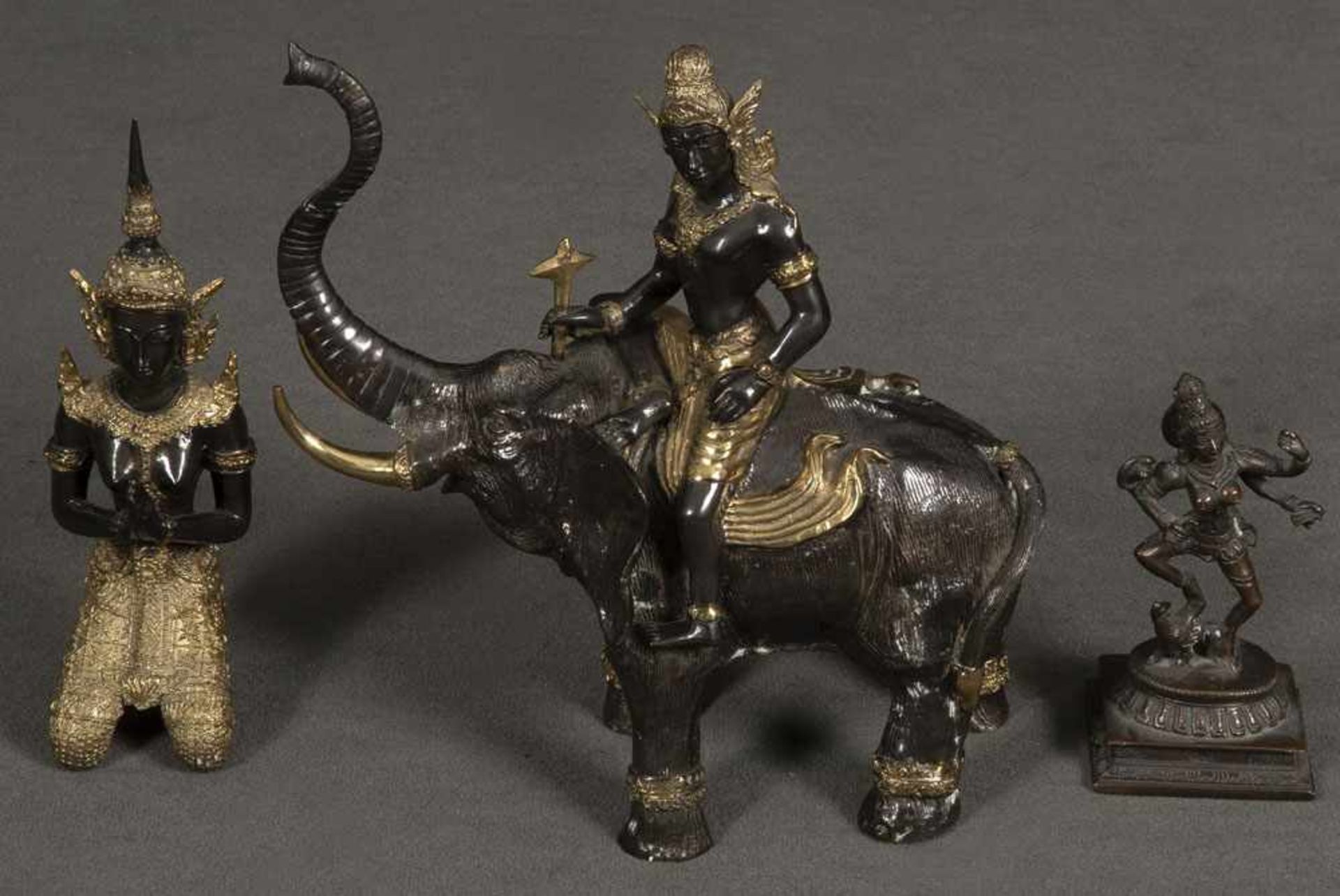 Zwei Shivas und Elefantenreiterin. Asien. Metall, vergoldet, H=15 bis 27,5 cm.