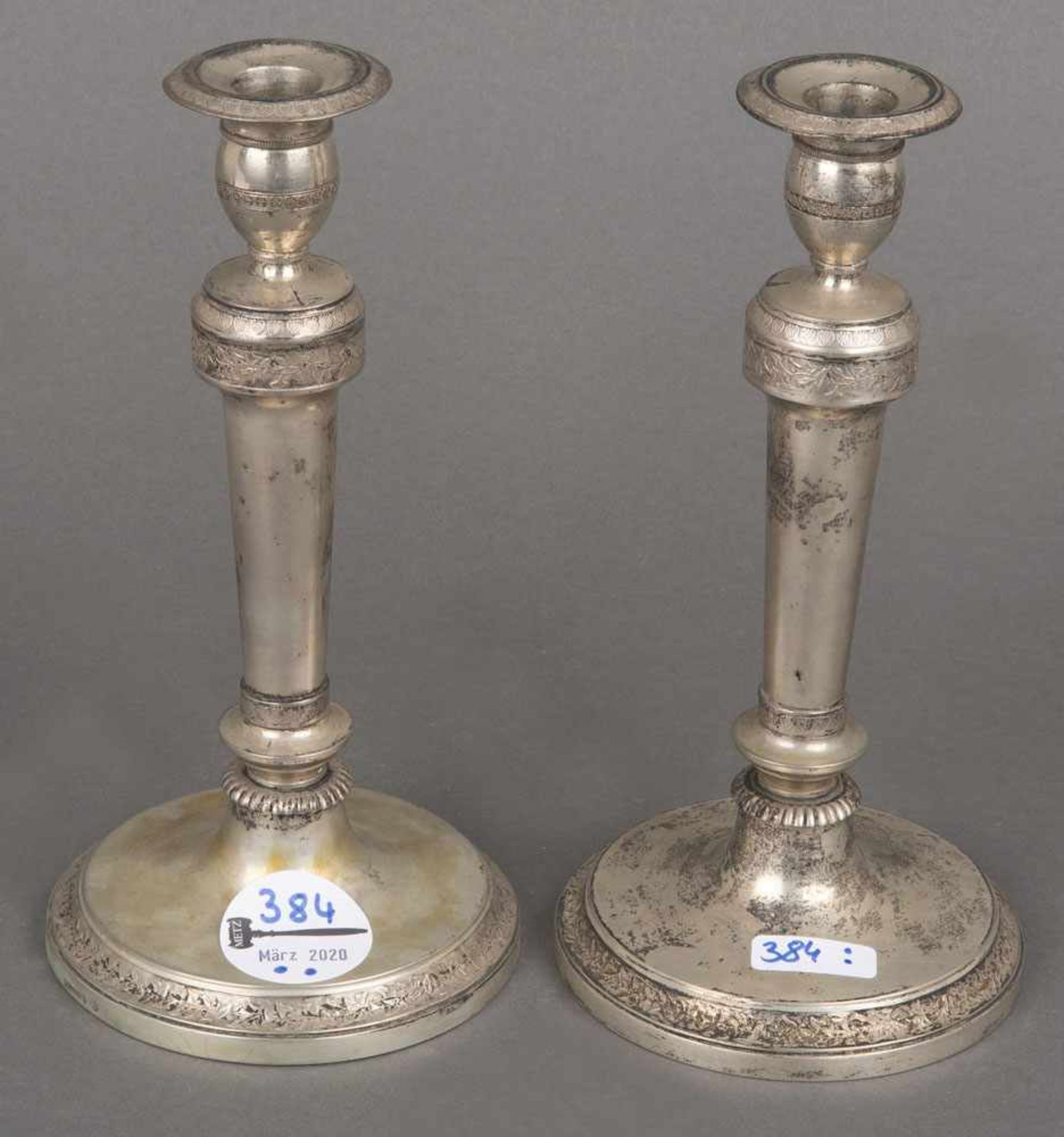 Paar Kerzenleuchter. Deutsch 19. Jh. 13lötiges Silber, ca. 518 g, H=19,5 cm.