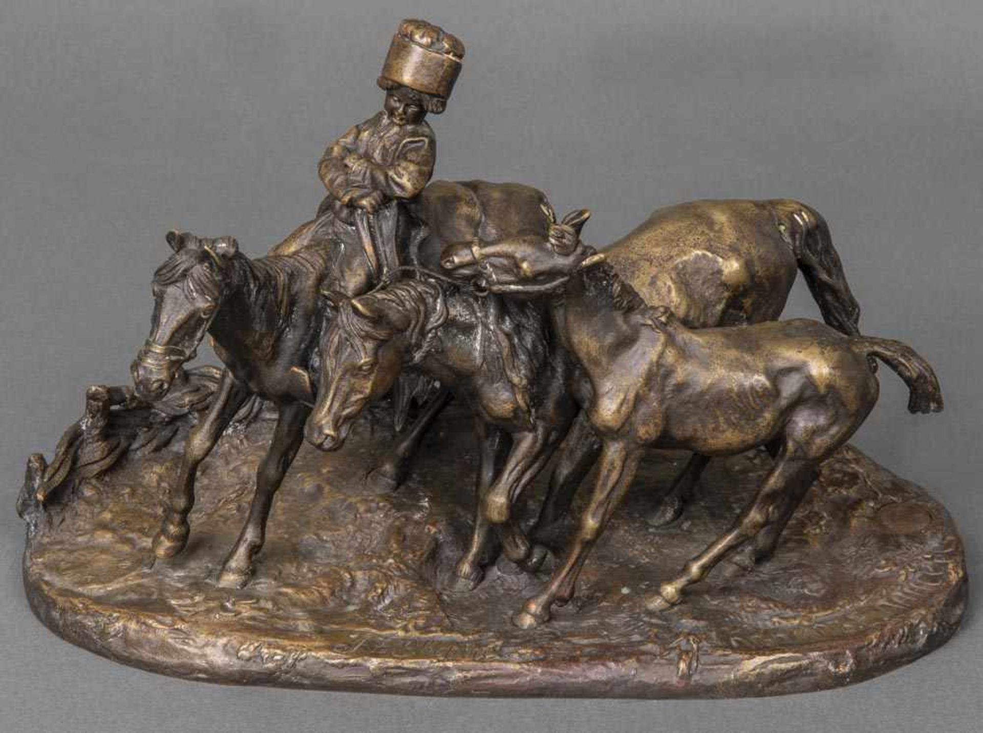 Evgeny Alexandrovich Lanceray (1848-1886). Junger Kosake mit drei Pferden. Bronze, zweifach sign.,