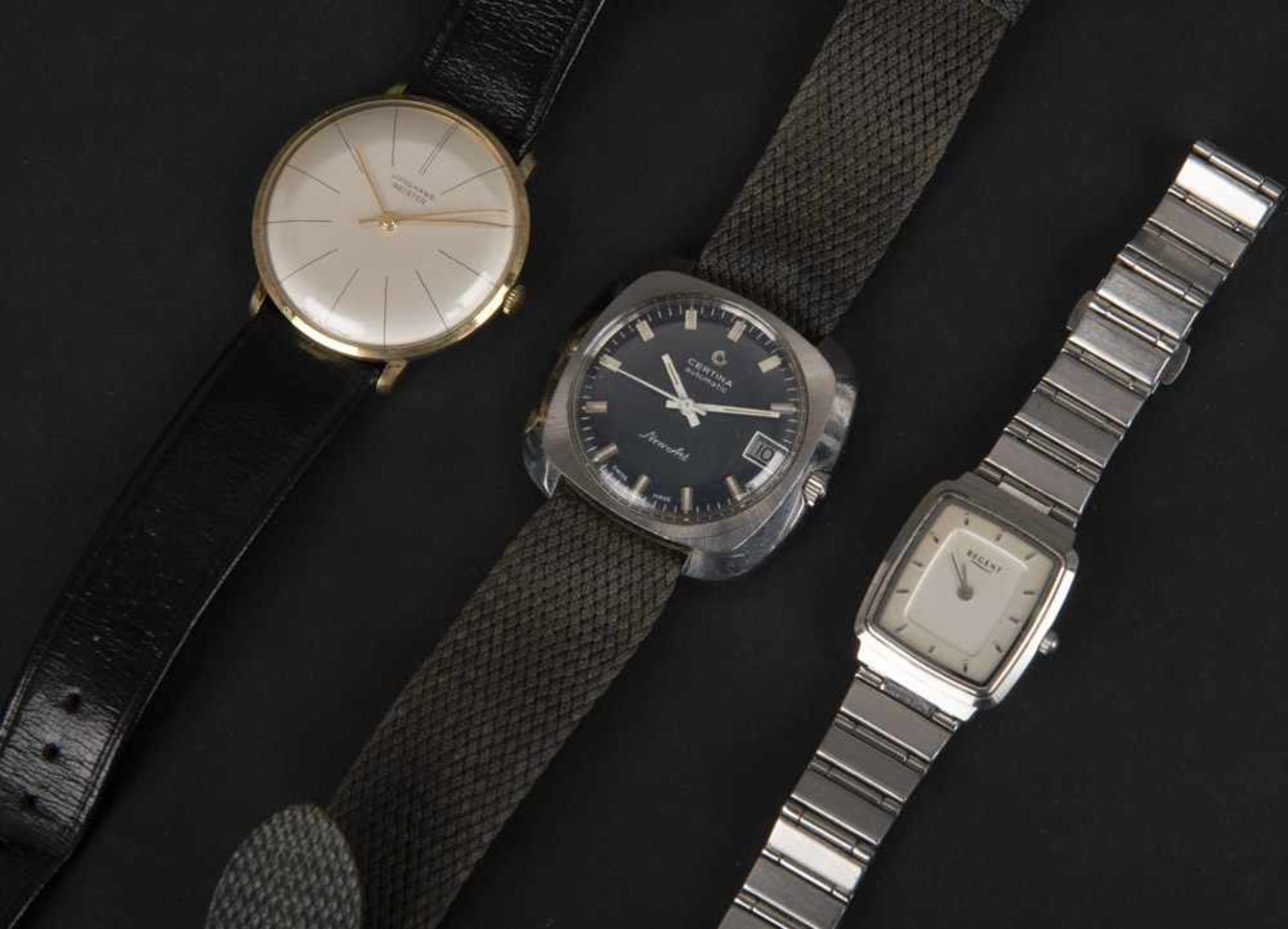 Drei unterschiedliche Armbanduhren, u.a. Marke Junghans, Certina. (Gängigkeit ungeprüft)