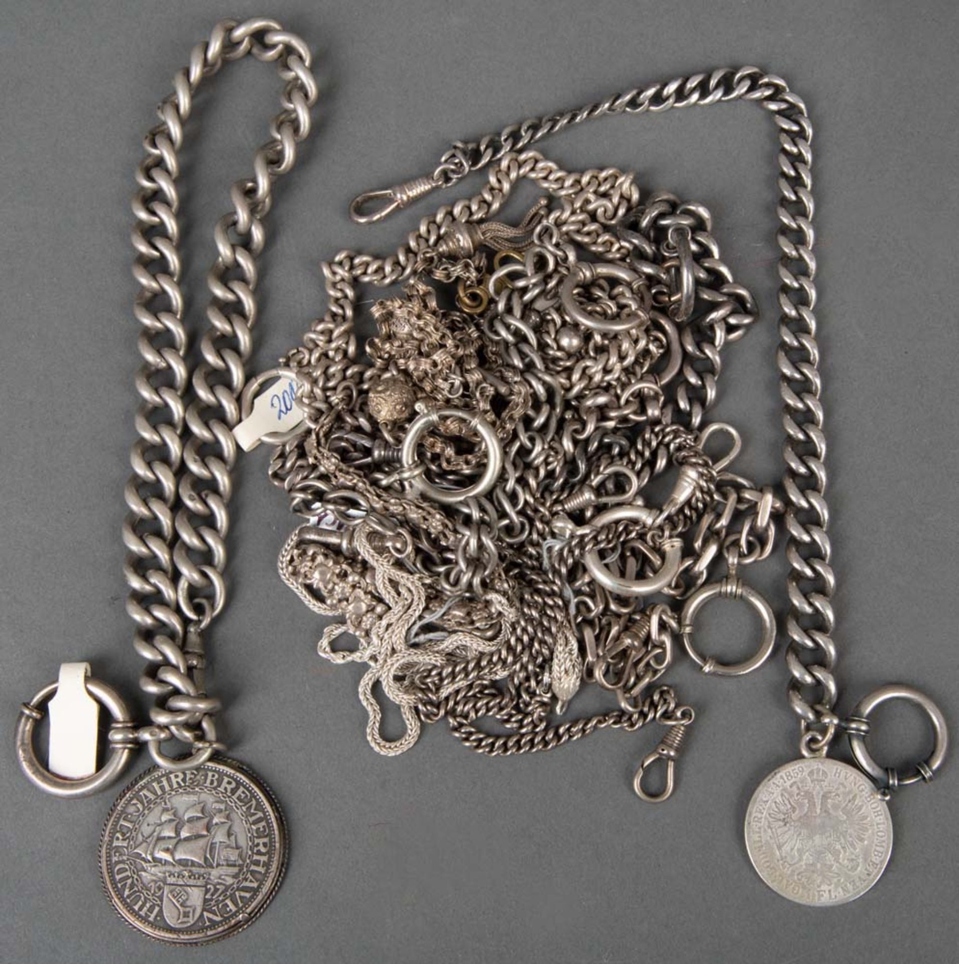 Zwölf Uhrenketten, u.a. Silber, ca. 400 g, L=25,5 bis 46 cm.