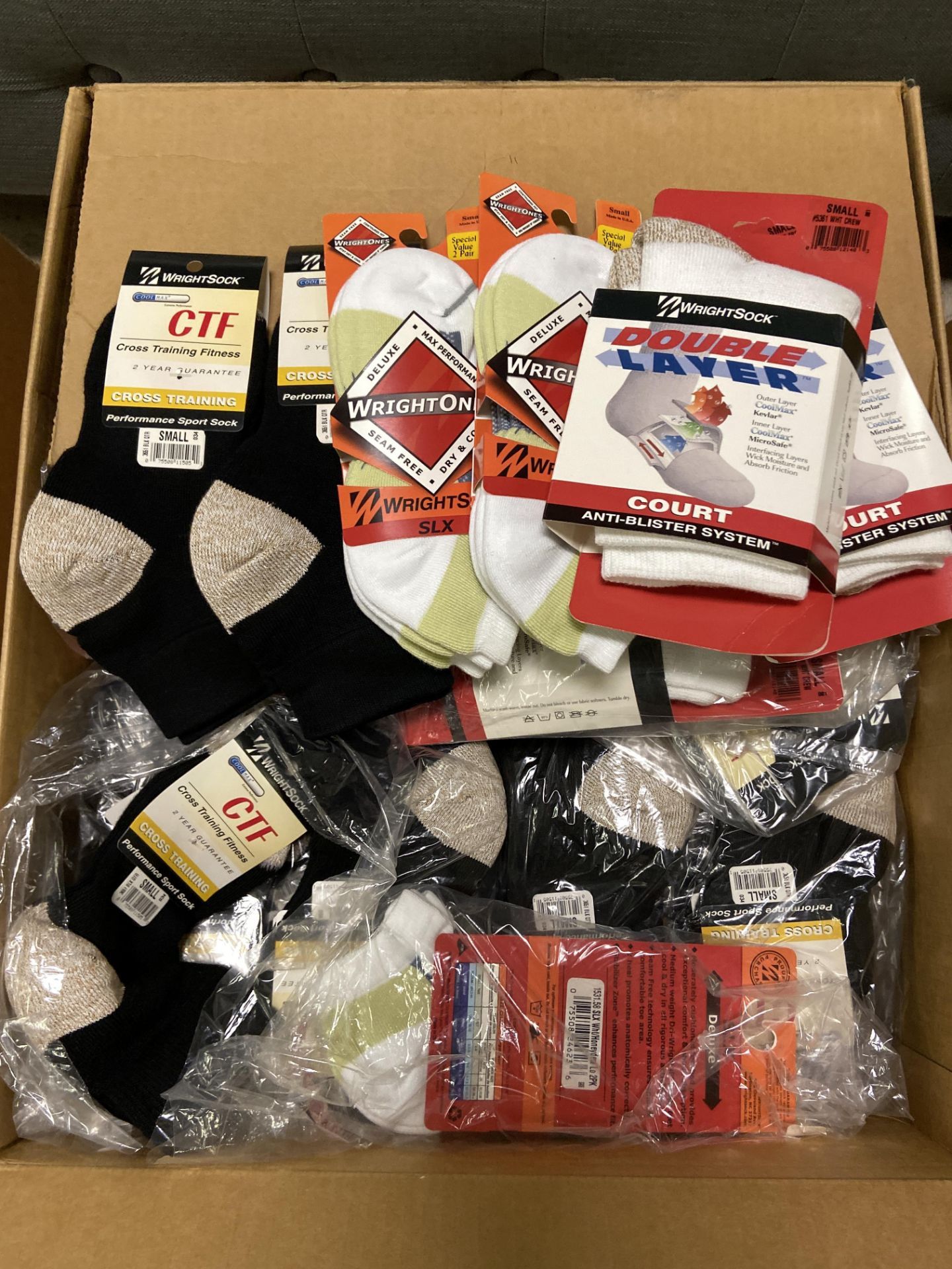 250+ packs of New Socks, Wrightsocks Various Styles, Various Colors Lot includes approximately 250