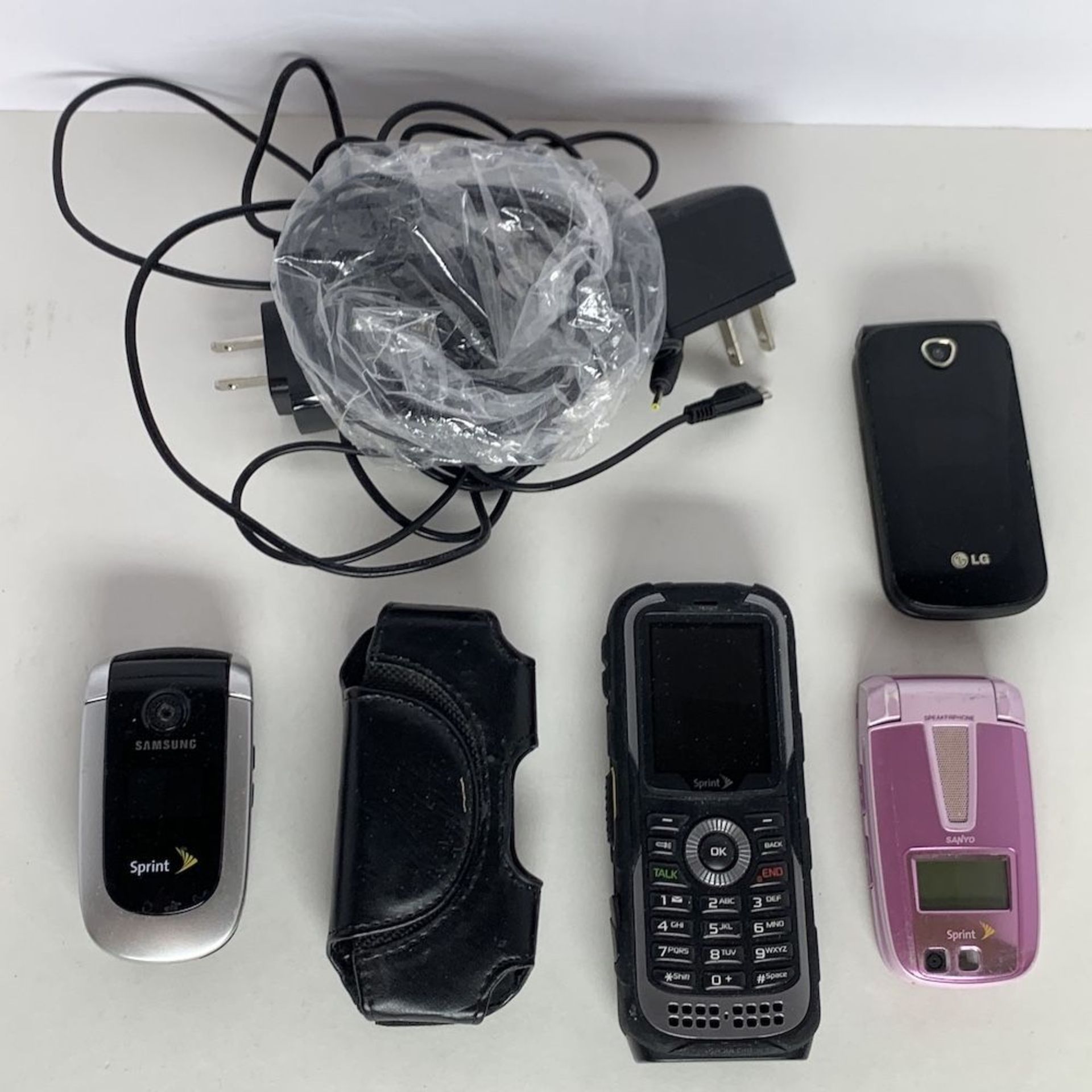 4 Cell Phones and Chargers with Accessory - Image 2 of 2