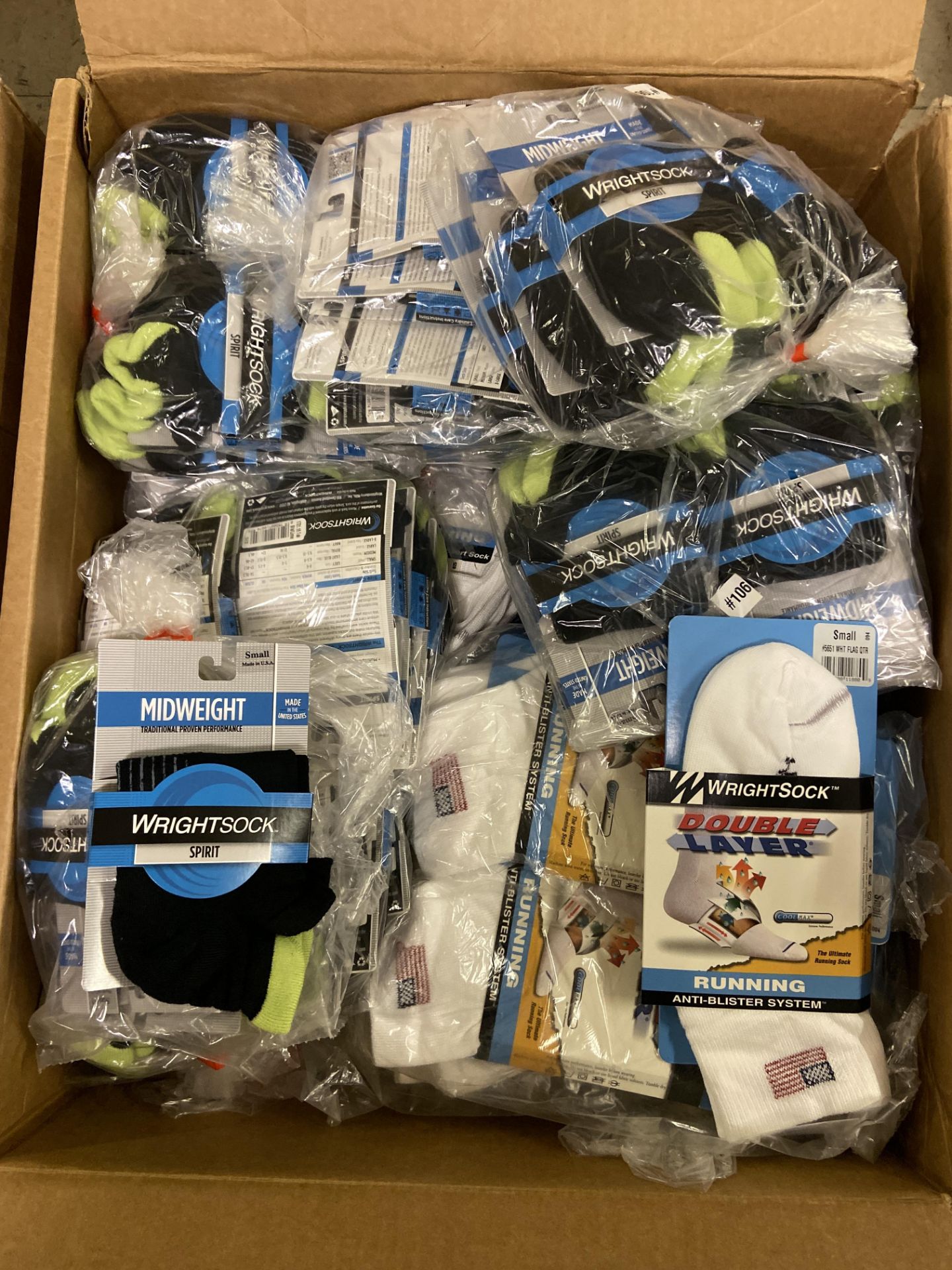 250+ packs of New Socks, Wrightsock Running and Midweight, Double Layer, White with USA Flag and