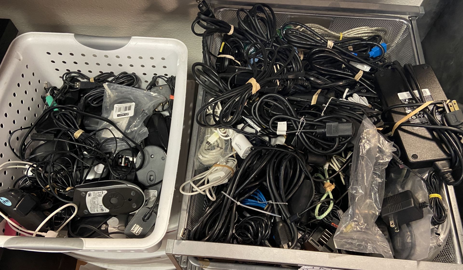 Assorted computer chargers, cords and mice