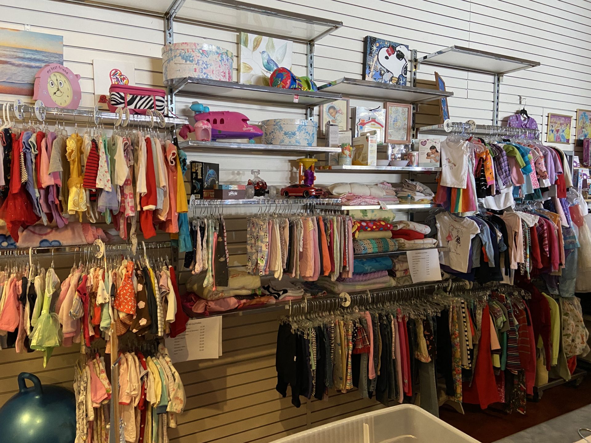 Children's clothing, entire wall of clothes as shown