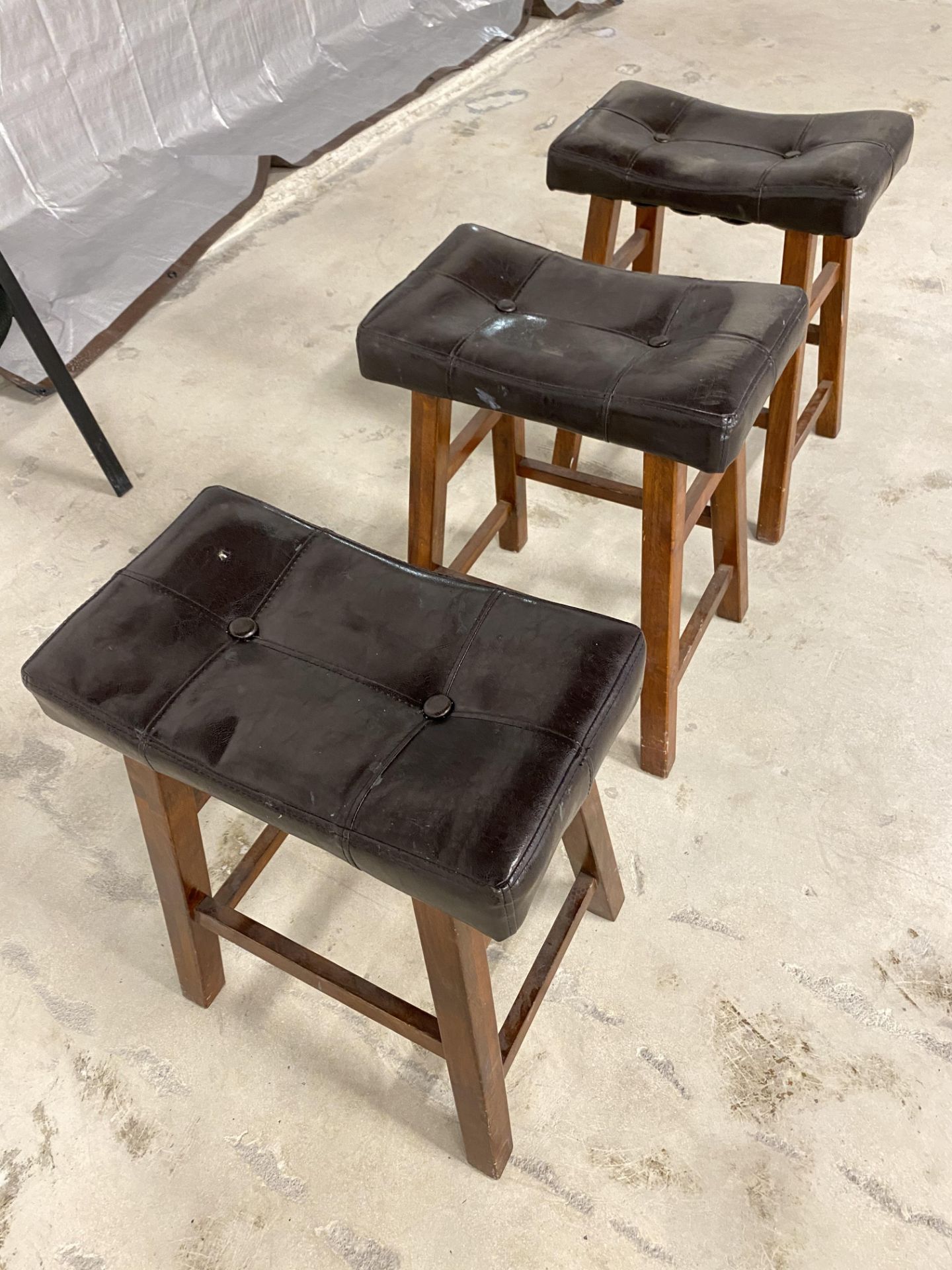 3 BROWN LEATHER STOOLS