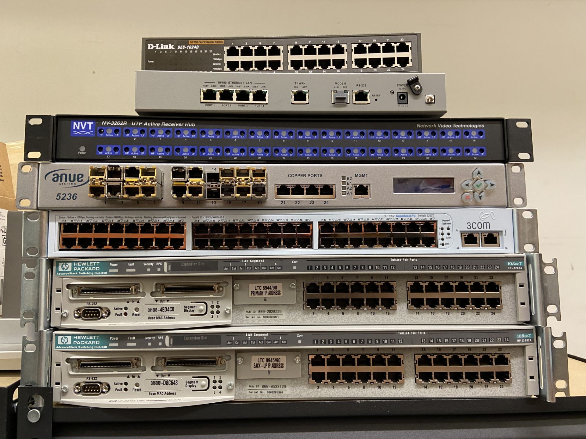 7 Networking Equipment units: HP, D-Link, NVT, Anue, Etc