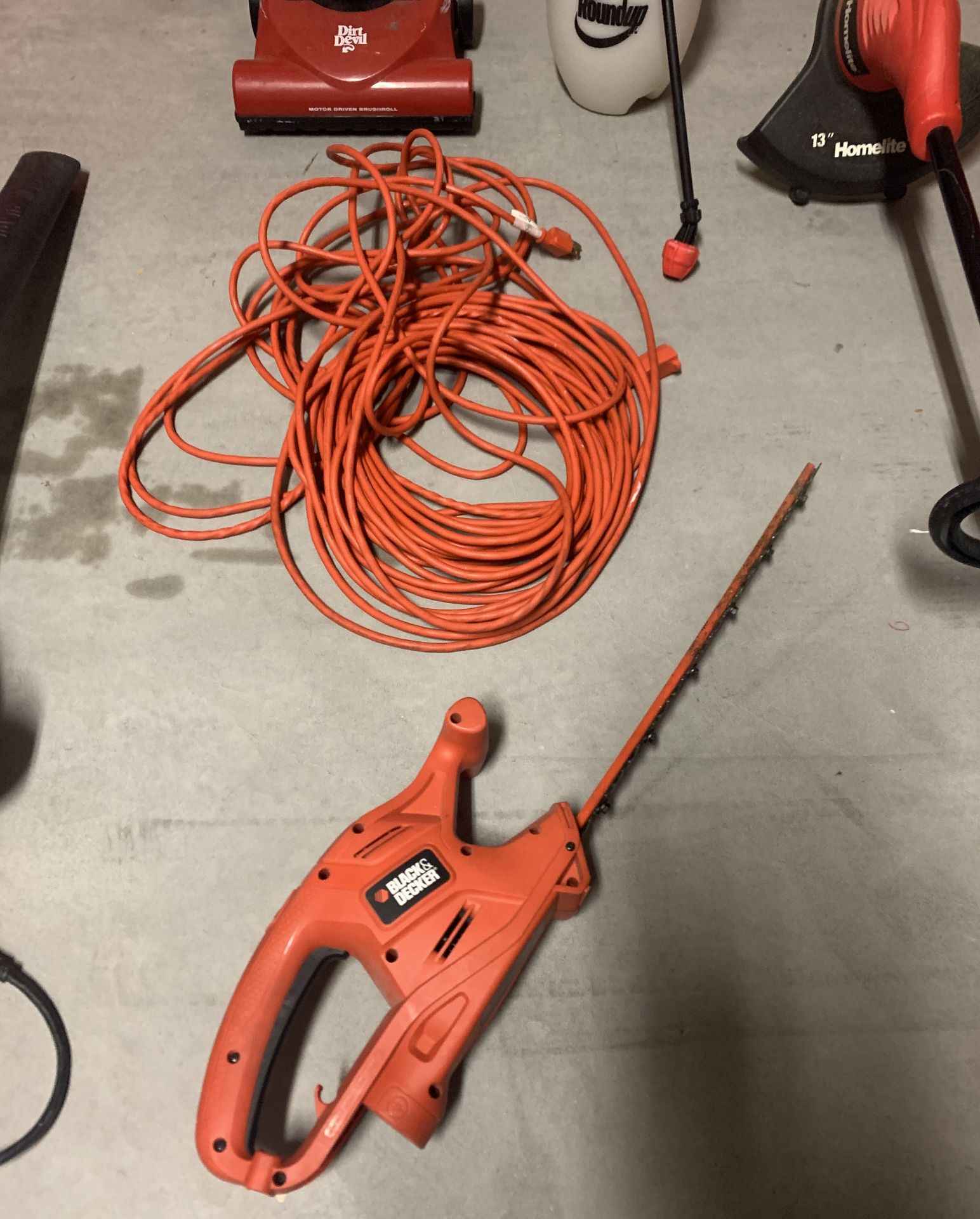 BLACK & DECKER HEDGE TRIMMER, LEAF BLOWER, SHRUB TRIMMER, EXTENSION CORD, DIRT DEVIL VACUUM + - Image 2 of 6