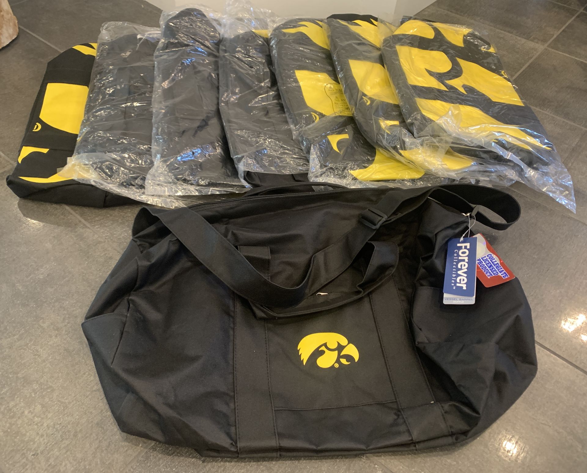 LOT OF 8 UNIVERSITY OF IOWA HAWKEYES LICENSED DUFFEL TRAVEL BAGS BRAND NEW