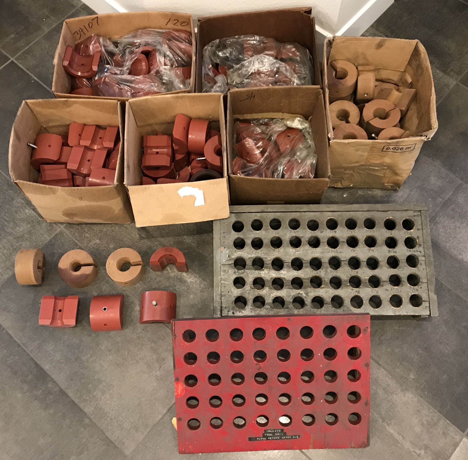 LOT OF 5 BOXES OF RUBBER TUBE CNC GUIDES. TWO WOOD TOOL HOLDERS.