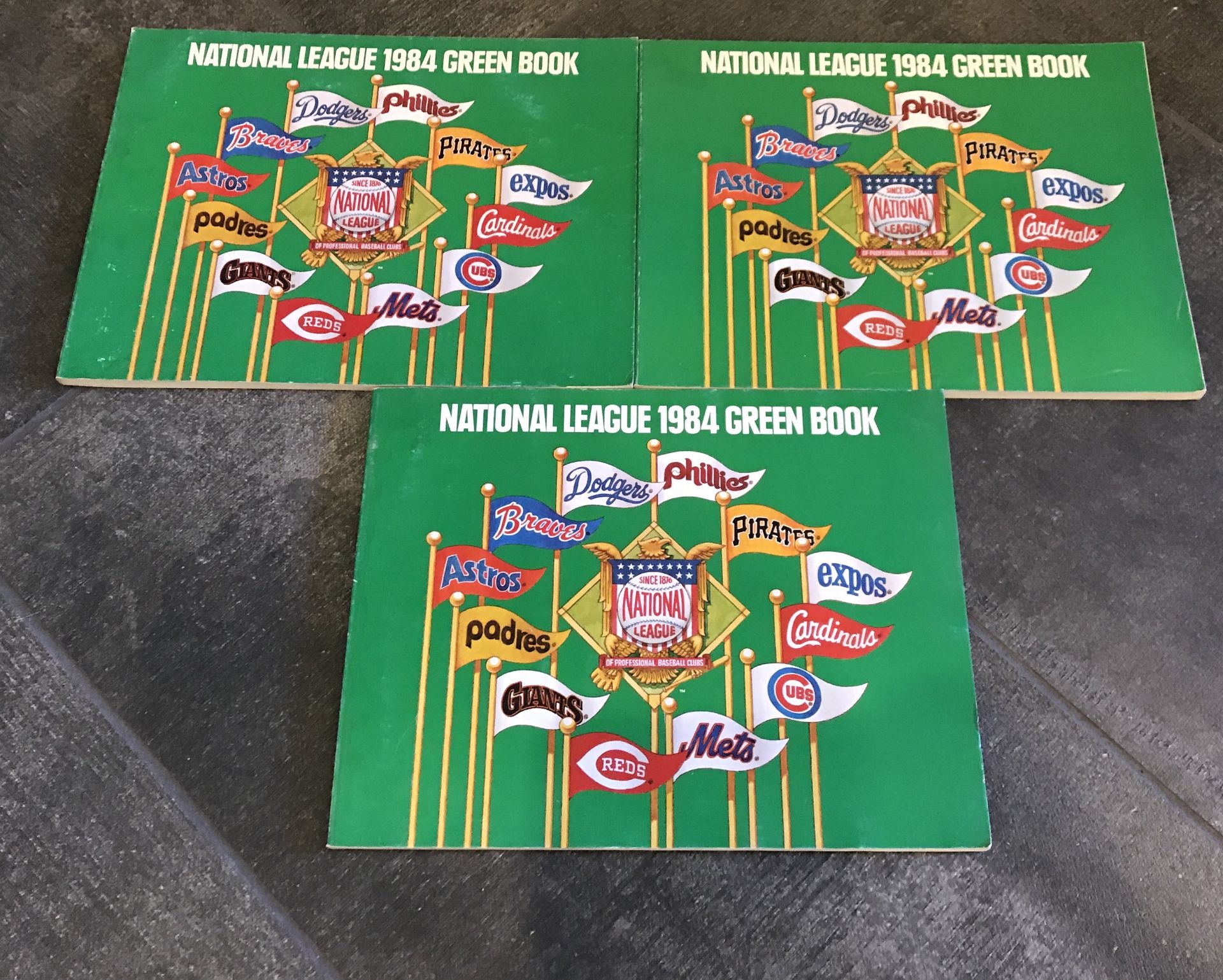 LOT OF THREE NATIONAL LEAGUE 1984 GREEN BOOK