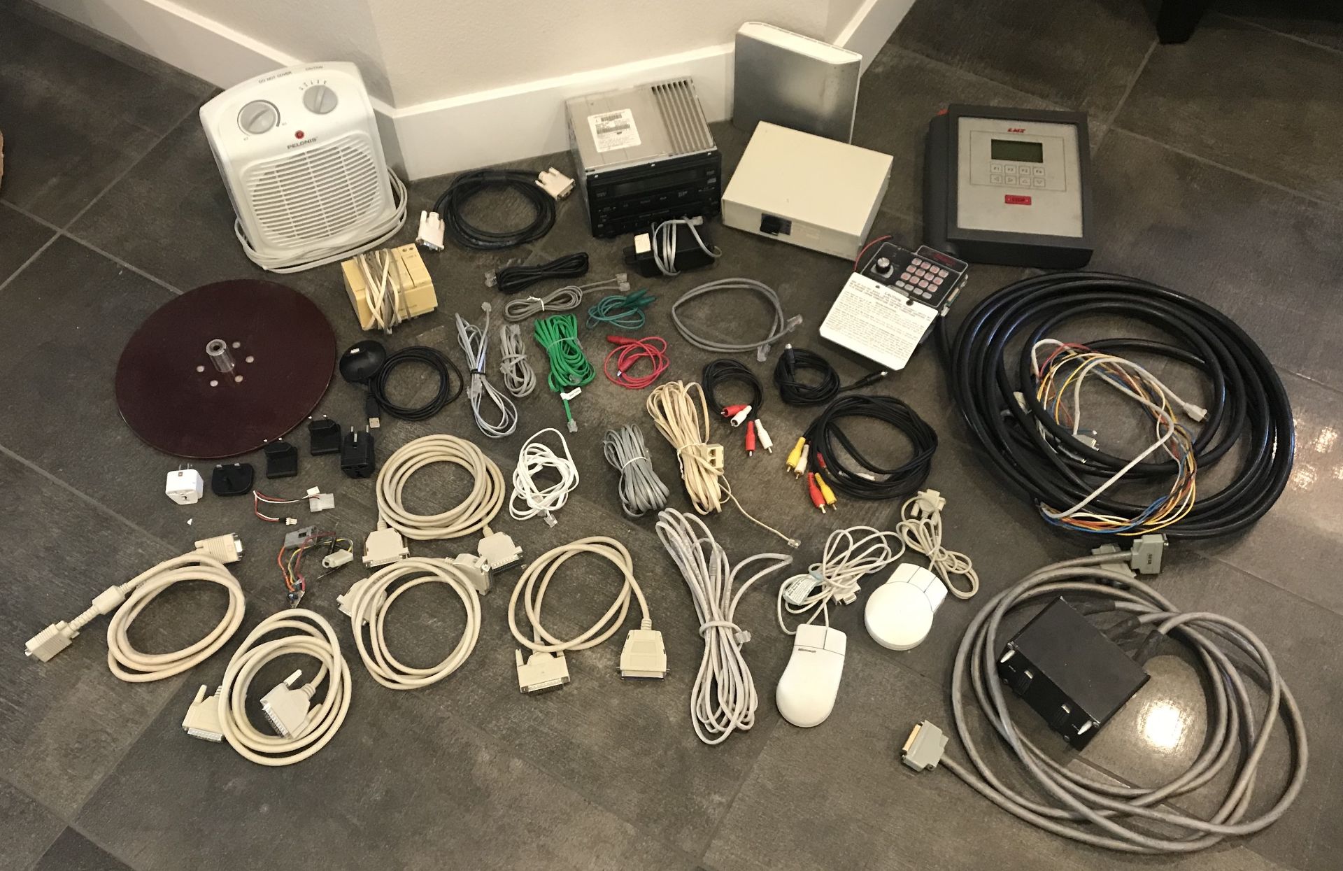 ASSORTED LOT OF ELECTRONIC OUTLETS, WIRES, SWITCH BOX, PORTABLE HEATER, CAR RADIO AND COMPUTER MICE.