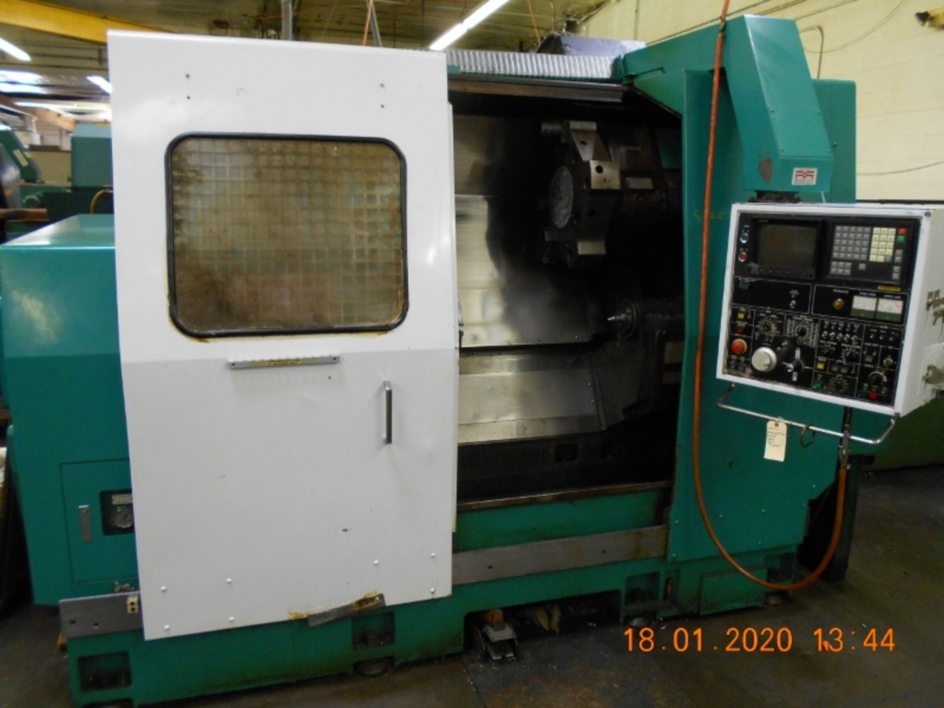 Nakamura Tome Slant 4 CNC Turning Center with Fanuc 11T Controls SB-4 Serial # C40901