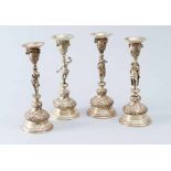 Set of four seasons silver candle sticks