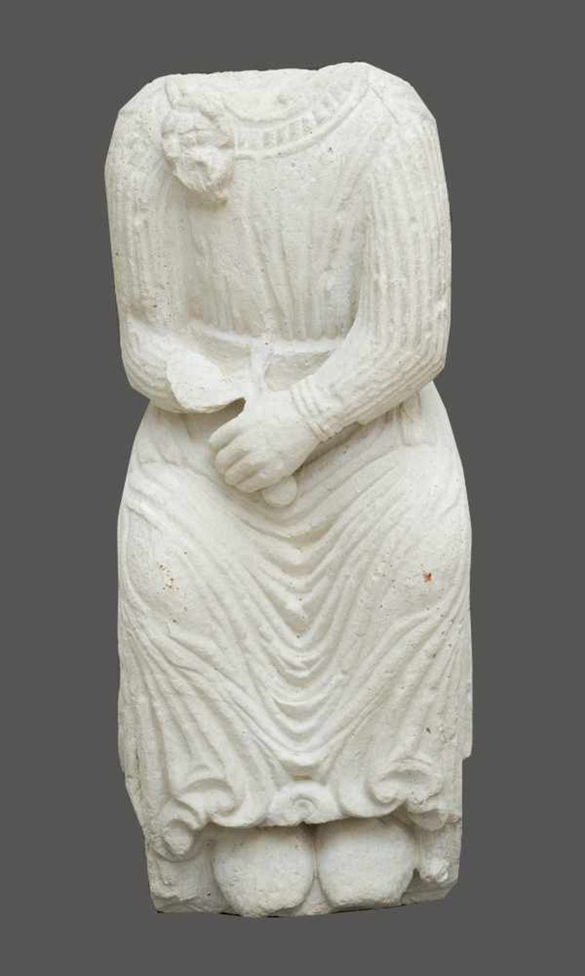 Torso of a sitting male sculpture