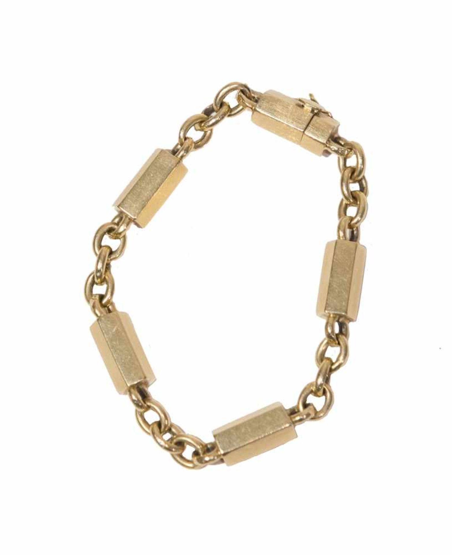 BRACCIALE IN ORO GIALLO 18K Realizzato da catena alternata a piccoli lingotti poligonali . Peso