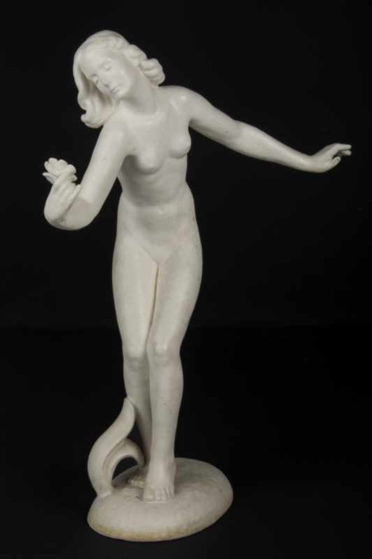 Figur um 1930weiblicher Akt mit Blüte, Fayence, Marke Keramos, Höhe 55 cm;