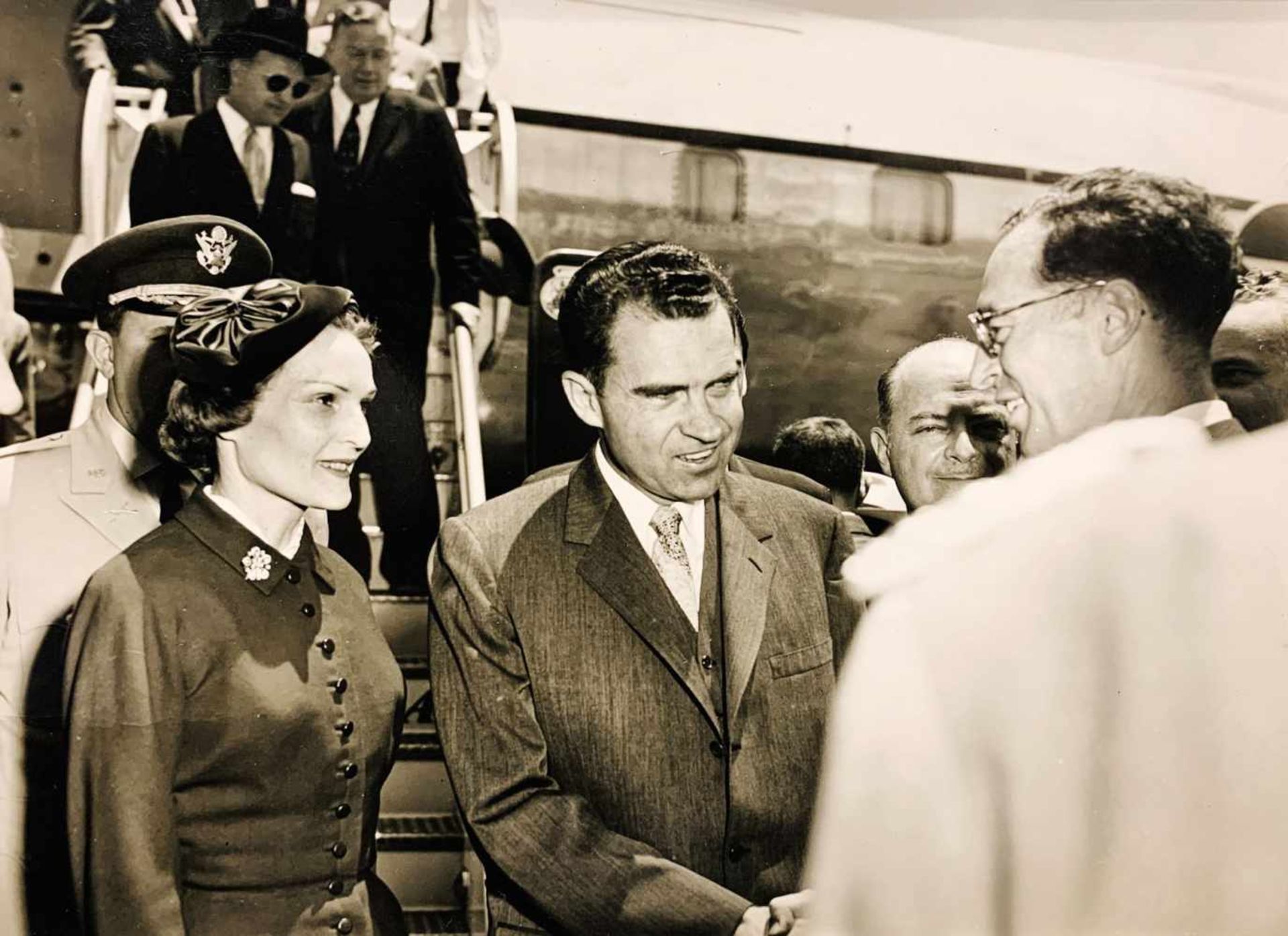 Richard Nixon and his wife Patricia, welcomed by Caracas government officials, Venezuela, just