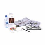 "The Walled Off Hotel" - set of three t-shirts, an artwork, postcards, pencil, soap, bottle of