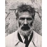 Constantin Brancusi in his work robe