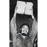 Fidel Castro showing the 30 milion dollar worth of cheques, donated to his campaign by workers