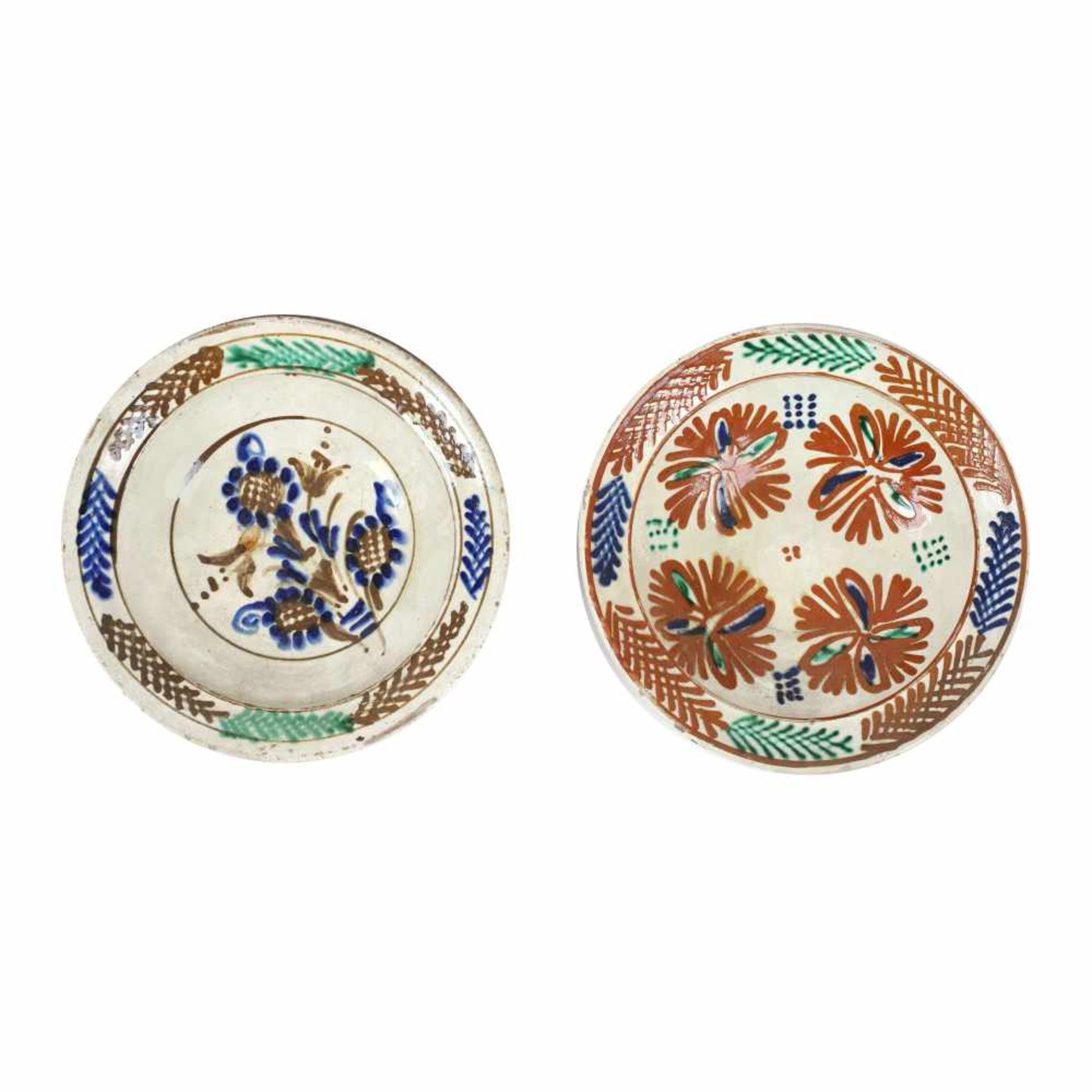 Pair of plates, decorated with chrysanthemums, Făgăraș, approx. 1900, and Arpașu de Jos, Sibiu,