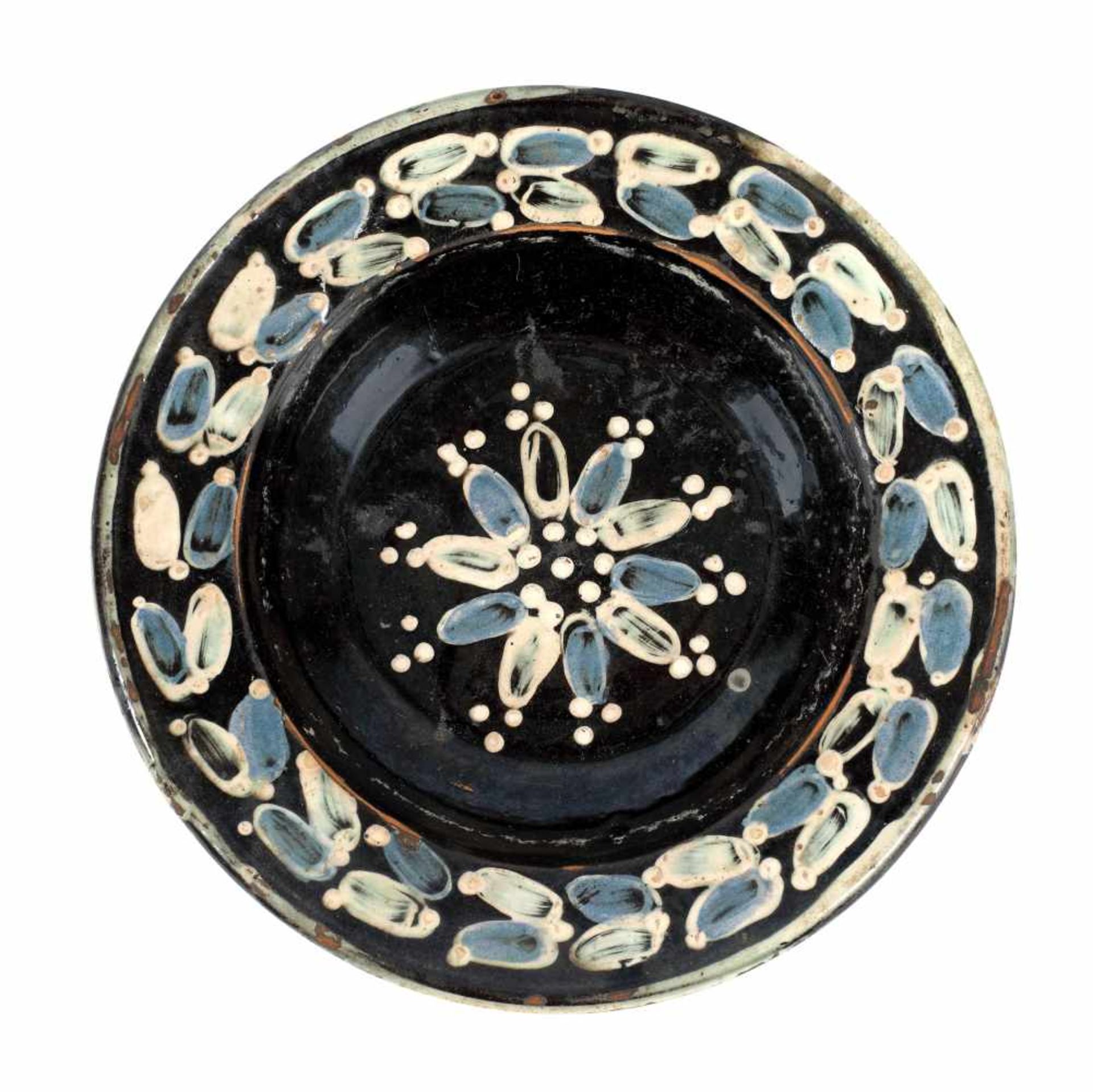 Plate, decorated with stylised floral motifs, Baia Mare, late 19th century