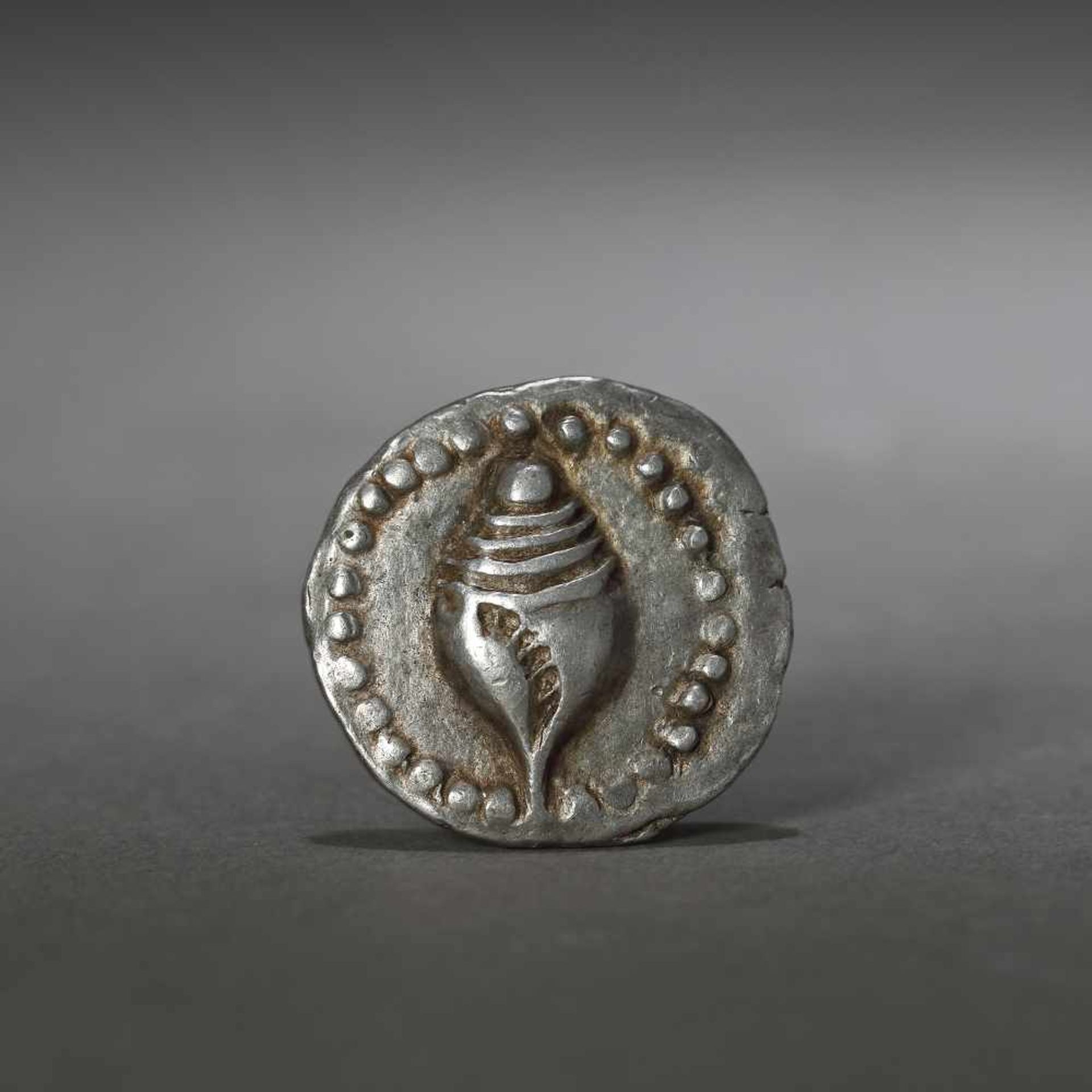 Silver coin, reproducing a shell, issued by the Kingdom of Dvaravati, Thailand, approx. 5th century