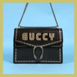 "Dionysus" - Gucci bag, leather, black, decorated with stellar motifs, accompanied by user manual an