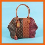 Louis Vuitton bag, "Trois matières" collection, designer Marc Jacobs, for women, accompanied by an