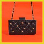 Chanel wallet-bag, quilted leather, with decorative charms, for women, accompanied by authenticity c